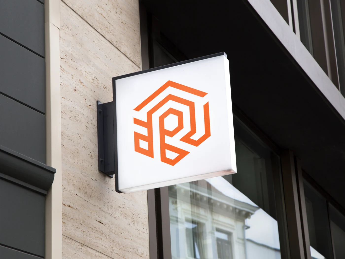 The orange hanging wall sign